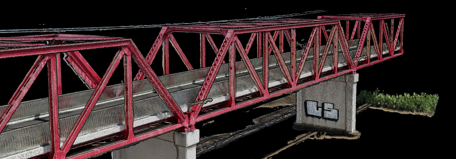 Photogrammetric point cloud of a steel truss rail bridge rendered on dark